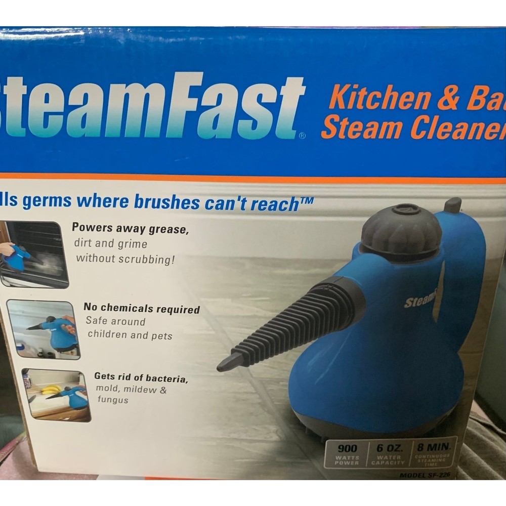 Steam Cleaner New in box with all attachments, instruction booklet Kills Germs